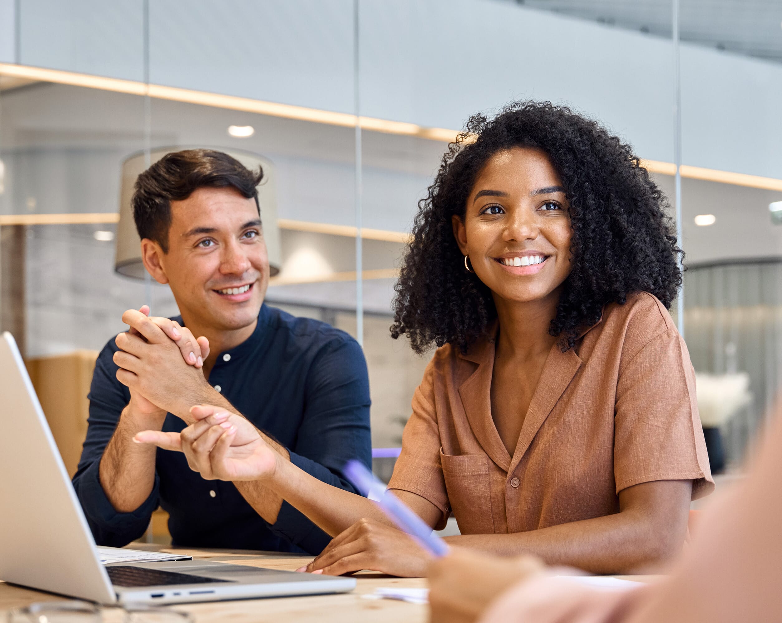 Lady and man talking to client