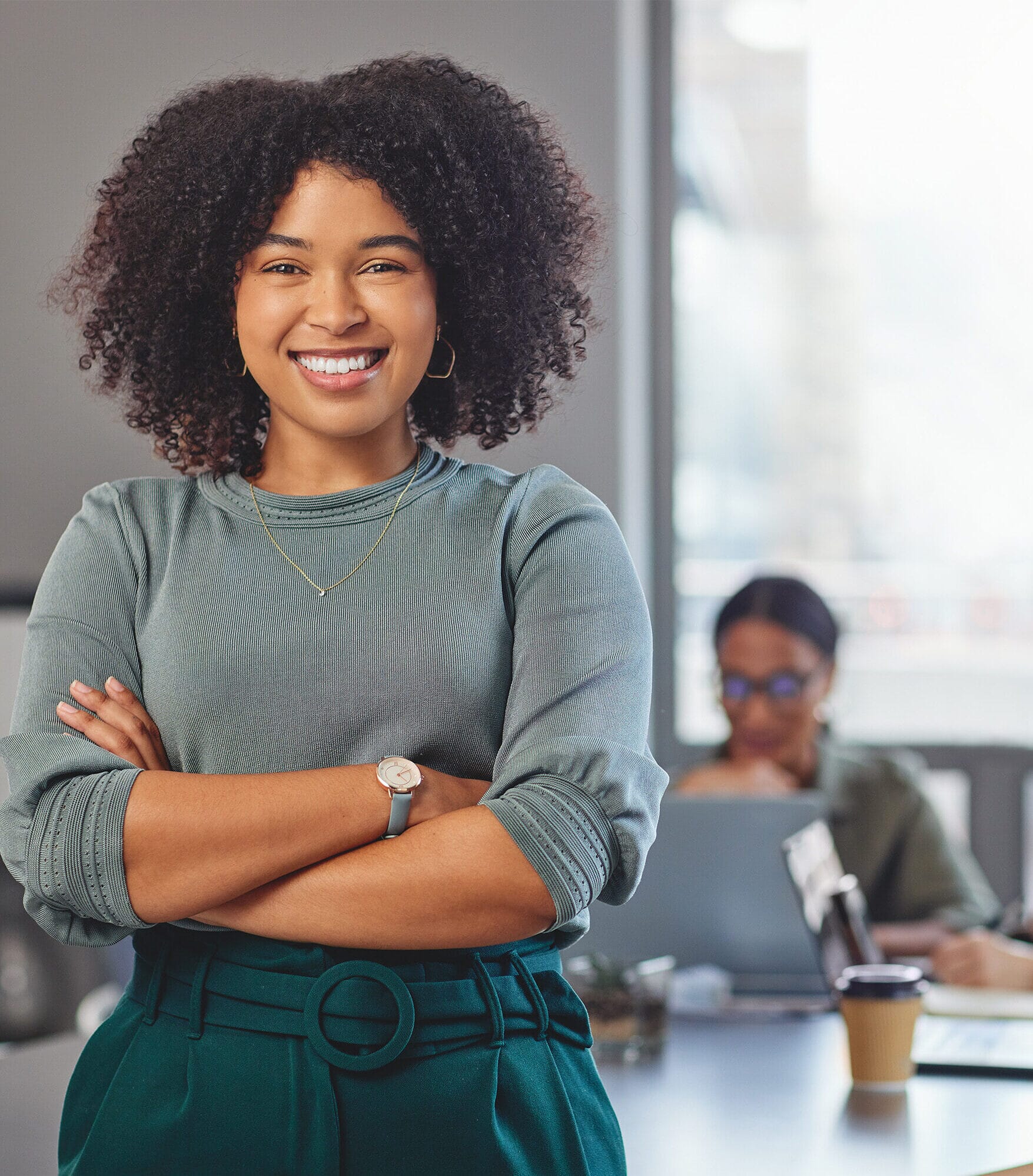 Lady smiling for camera at work