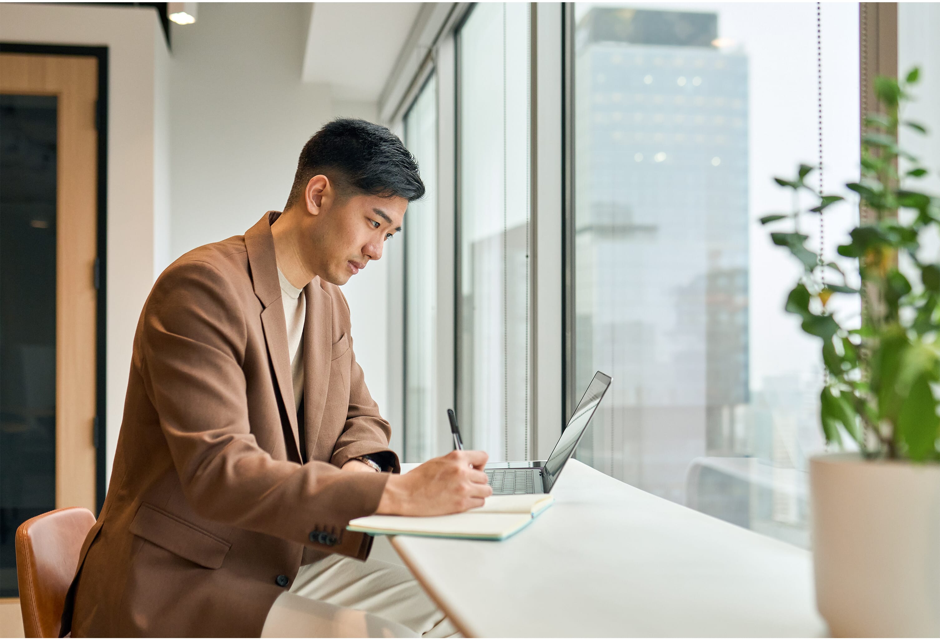Asian-man-on-laptop